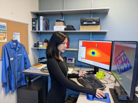 Jenny Wong works on a computer chip while at work at Qualcomm, Dec. 15, 2021.