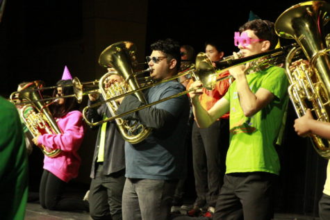 Chris Shimoon (12) and Luc Andreassi (12) wore sunglasses and brightly colored t-shirts as costumes with the low brass section and performed the song “Celebration” by Kool & The Gang, May 26. Students were able to choose this piece and costume to fit the student-managed Westview GOLD show theme of celebration, in honor of Westview’s 20 year anniversary.