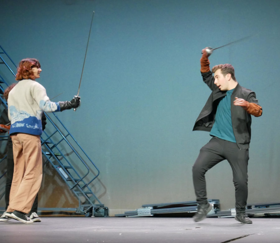  David Azcona (12) practic-es sword-fighting during rehearsal for CETA’s high school theater festival, Jan. 10. WVTC decided to per-form the fight choreogra-phy from their production of The Three Musketeers. Photo by Grace Tseng. 
