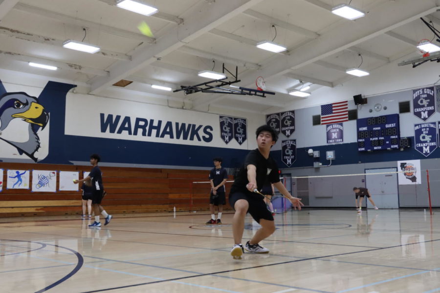 In a game against Madison High School, Allan Fang (10) gets ready to return his opponents serve in his mens singles match, April 28. Westview won 10-7 in the game determining which school ranks third. 