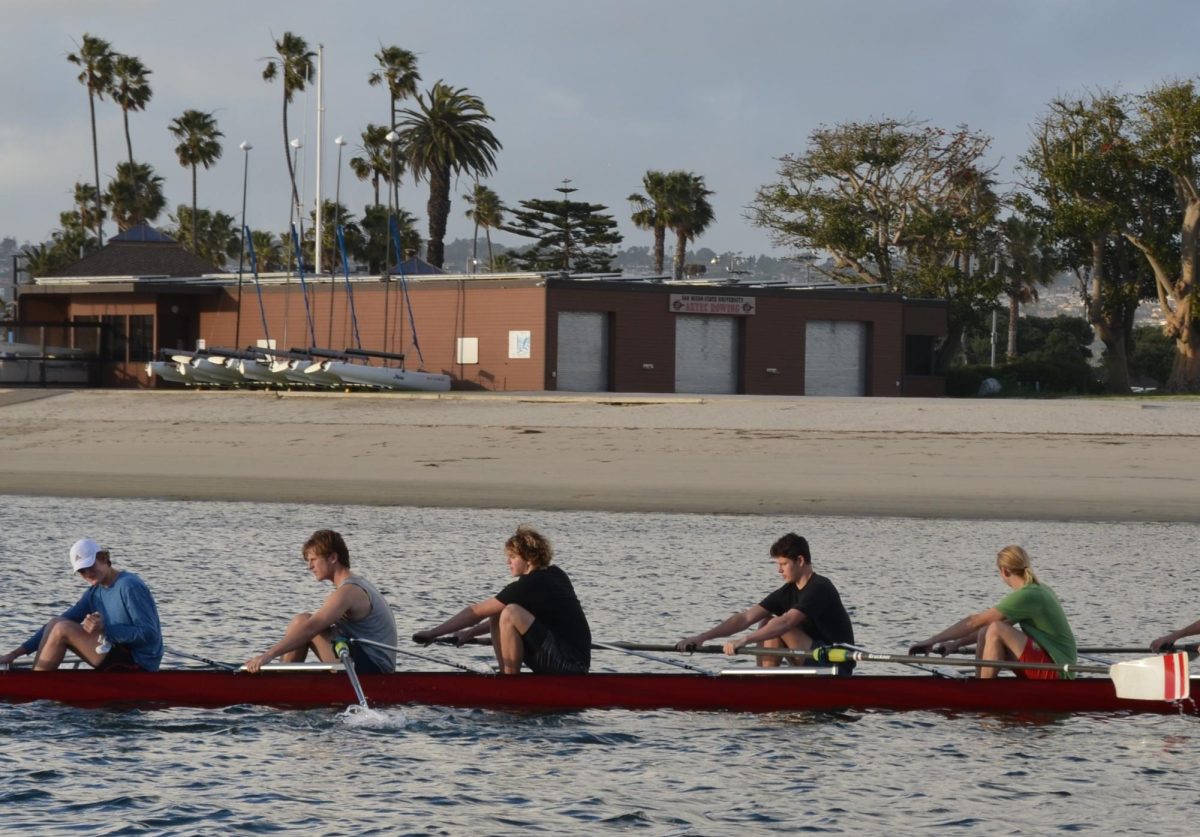 Alexander McAllister (10) [third from the left] practices with his rowing team at Mission Bay, Feb. 8. McAllister has learned to work in unison with others on the water. 