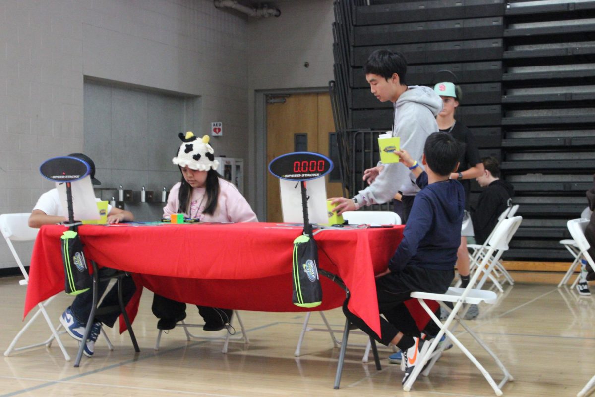 Franklin Pham (11) collects scores at the Cubing Favorites competition, May 25. The competition ran for 10 hours from 8 a.m. to 6 p.m.