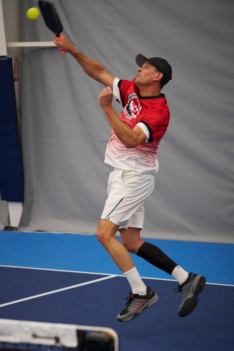 Keith Jain reaches to return the ball during a game in a National Pickleball League tournament in Cincinnati, Ohio, July-19-21. As a part of the Coachella Valley Scorpions, Jain has participated in a tournament with his team every month since May.