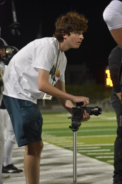 Conner Pietsch (11) films the Oceanside football game, Sept.13. He is the official Westview football videographer. 