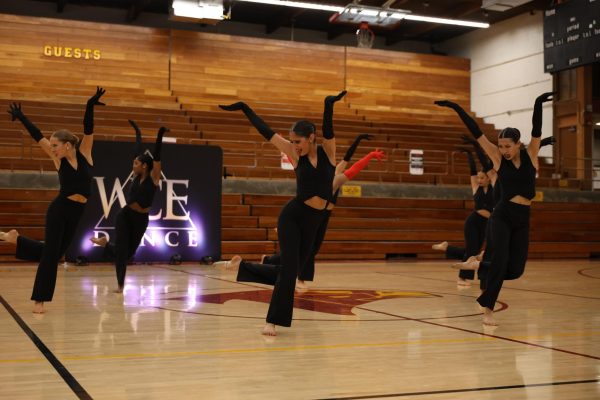 Dance Troupe members [left to right] Cece Canty (11), Bela Henderson (11), Anika Siddiqui (12), and Calista Nguyen (11) perform "Somebody I Used To Know," Jan. 19. The routine was choreographed by Sophia Sands (11) won first in the Small Contemporary category and the Troupe's performance across the whole competition garnered them the Best Technique award. 