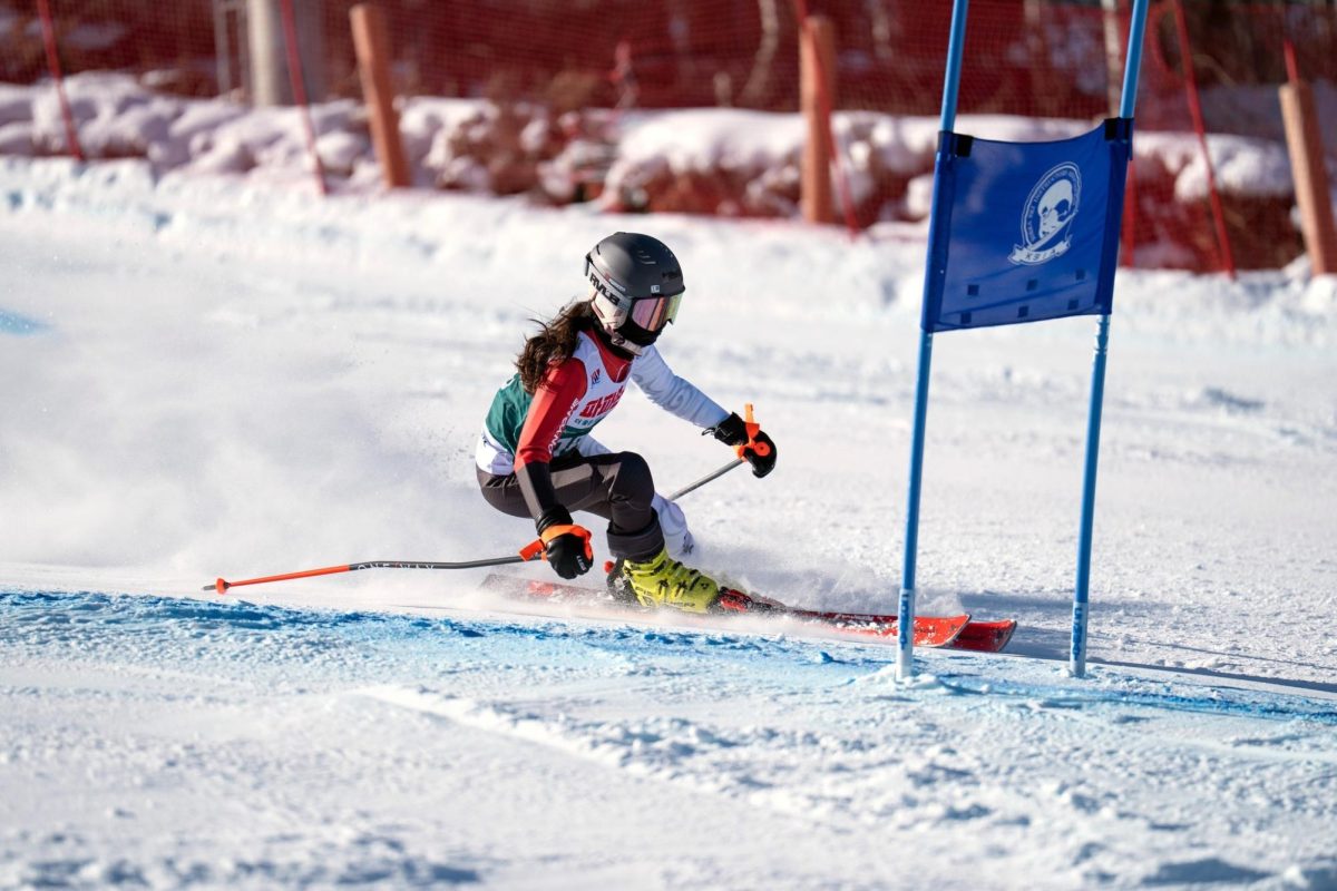 Allie Lim (10) skis toward the finish line at the Mona ParkYongPyong ski resort for the International Junior Ski Competition in Pyeongchang, Korea where she placed second, Feb. 11-13. This was Lim's second year participating in the international competition.