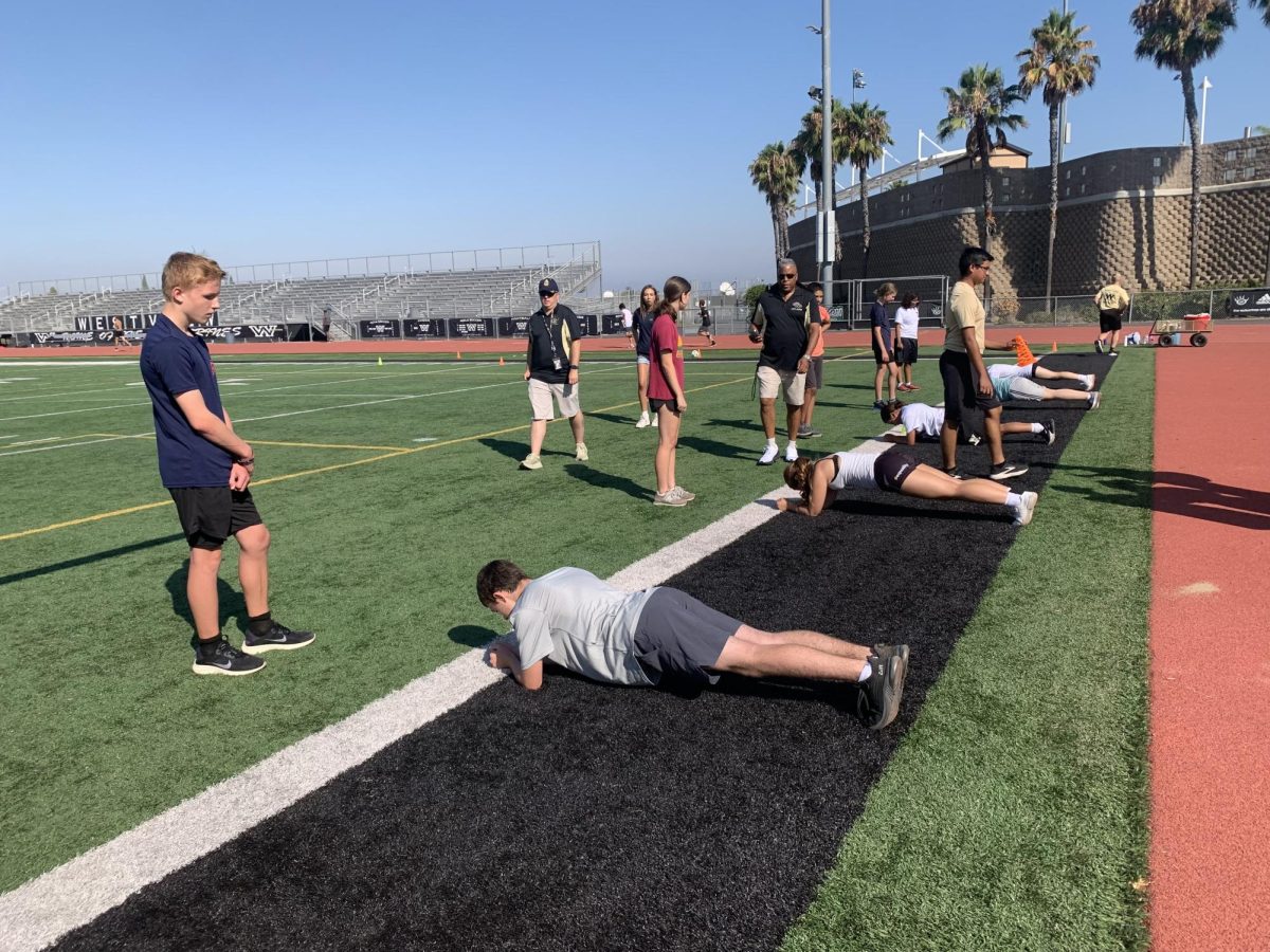 Incoming NJROTC cadets do pushup drills as part of their physical training, Aug. 8. The new students take part in NJROTC's NS1 Academy as a chance to learn more about the program.