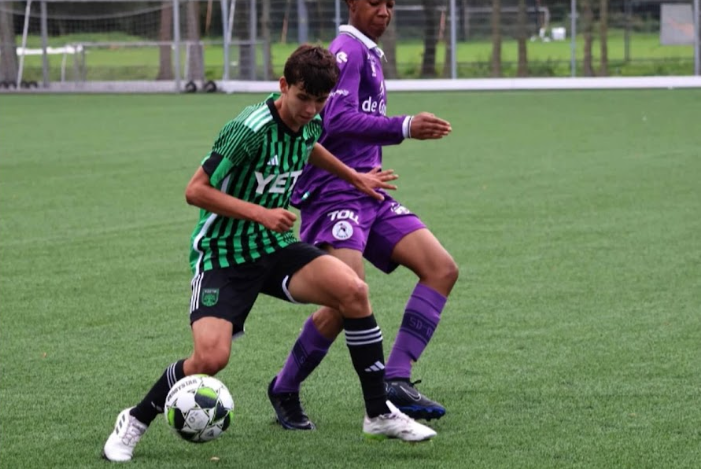 Atkinson returns to school after playing for professional soccer academies