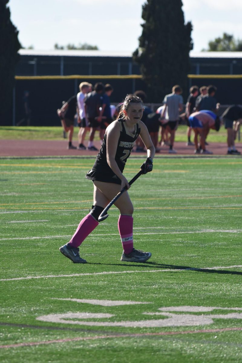 Harper Schwartz (11) tracks the ball during the first league game, Oct. 1. After an early lead, the Wolverines won 3-0.