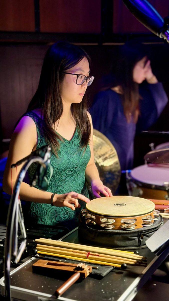 Veronica Xu (12) plays tambourine for The Nutcracker at the California Center for the Arts, Escondido.