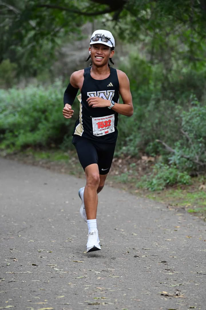 Kenrick Gunn (10) races through the San Diego Half-Marathon, Dec. 20. He placed first in 17-and-under category.