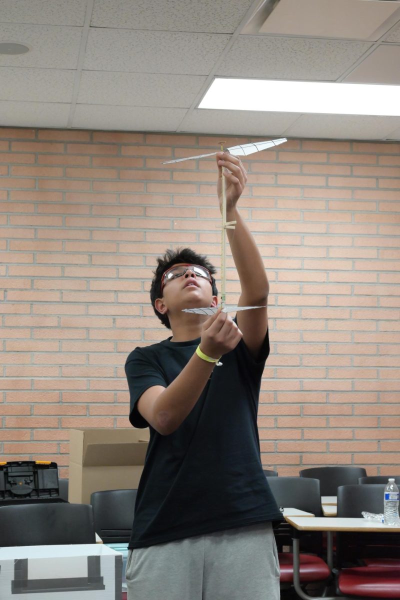 Sanchay Koppa (11) launches his helicopter for a final trial, Jan. 17. His team placed 19th out of 91 teams at the USC Invitational.
