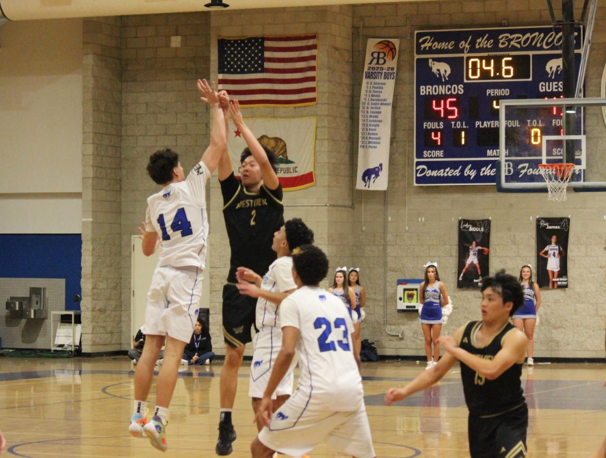 Boys basketball keeps game close, loses to RB