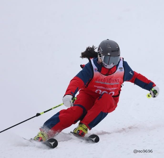 Allie Lim speeds down the slope during her race, Feb. 6. She won first place in the racing category and second in the technical category at the International Junior Competition in Korea. 