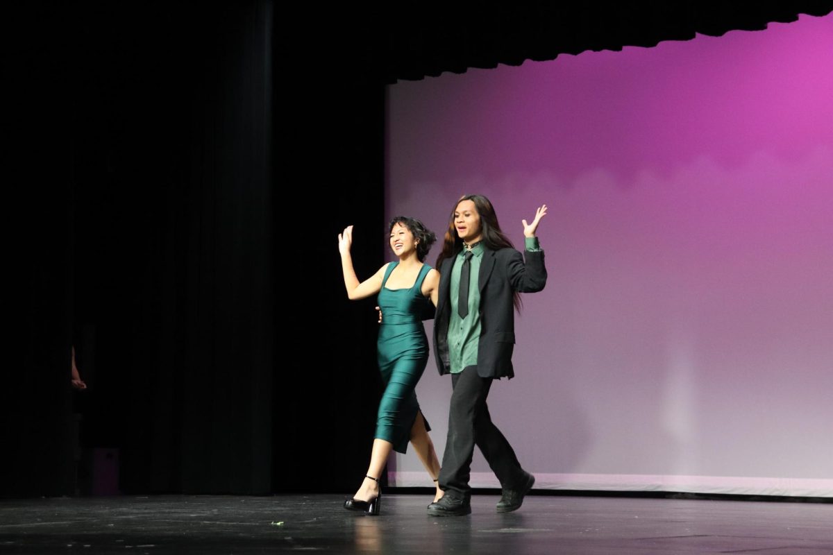 Camden Sermona (11) [right] and Aren Dizon (12) [left] introduce themselves to the audience before their rap battle. Sermona won the the title 'Mr. B' after various games, dance performances, and questionnaires. 