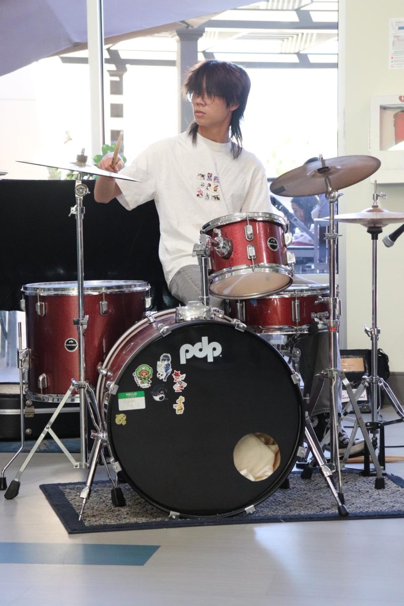 Dylan Bui (12) performs at Note by Note foundation's first event for Rady's Children Hospital children at the Ronald McDonald Charity House Charities, Saturday.