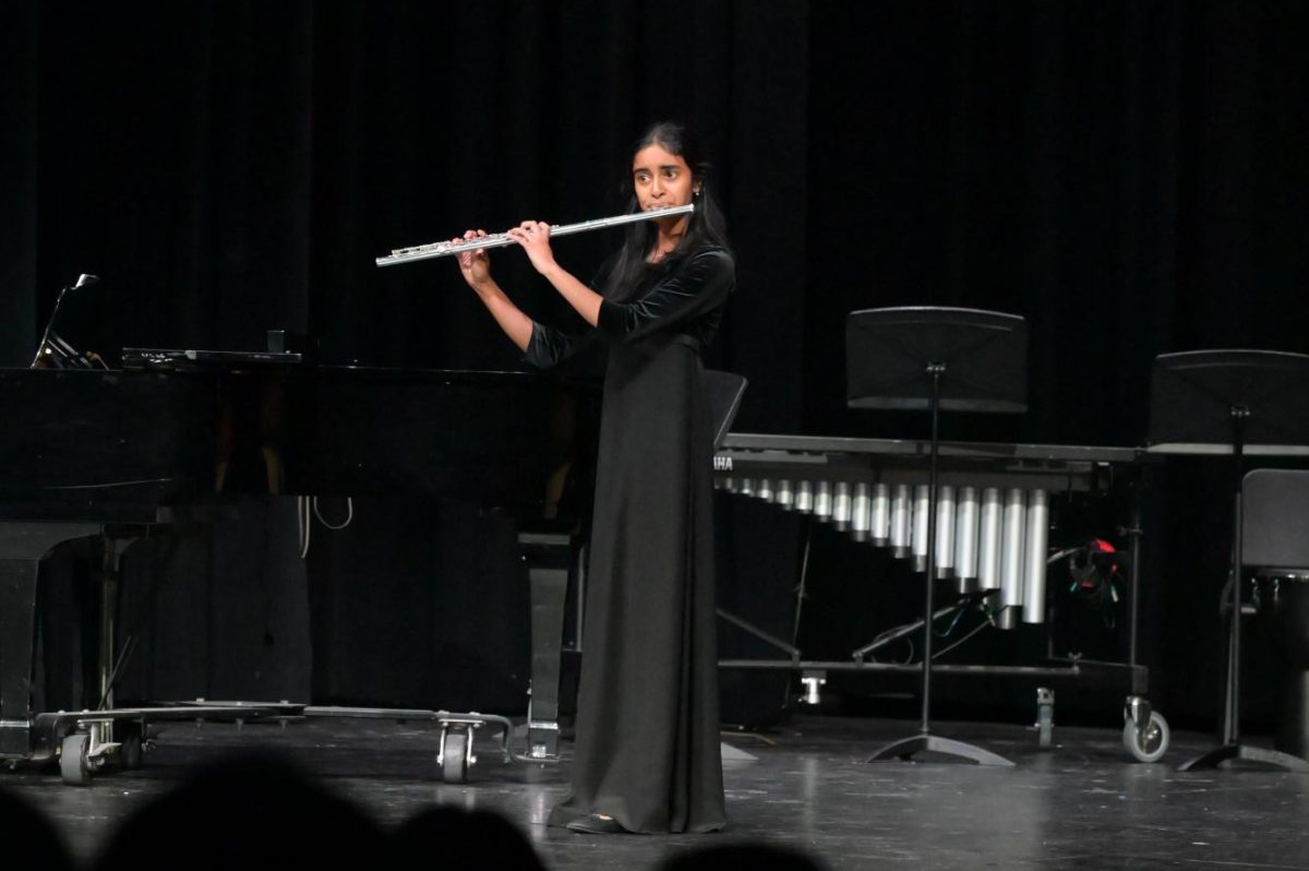 Rashmi Chelliserry (12) performs the Reineke Flute Concerto, Tuesday. She was selected to participate in From the Top.
