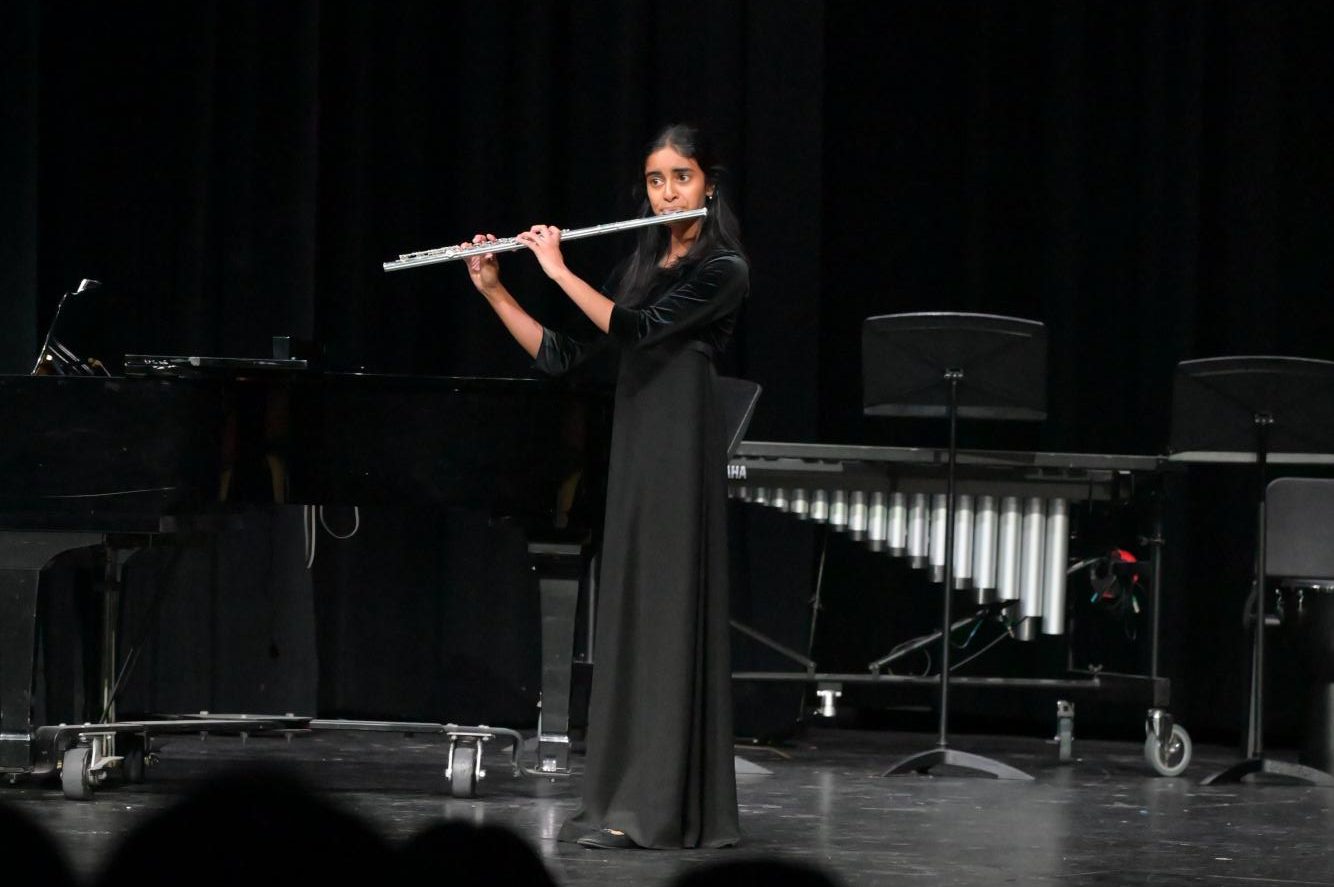 Rashmi Chelliserry (12) performs the Reineke Flute Concerto, Tuesday. She was selected to participate in From the Top.