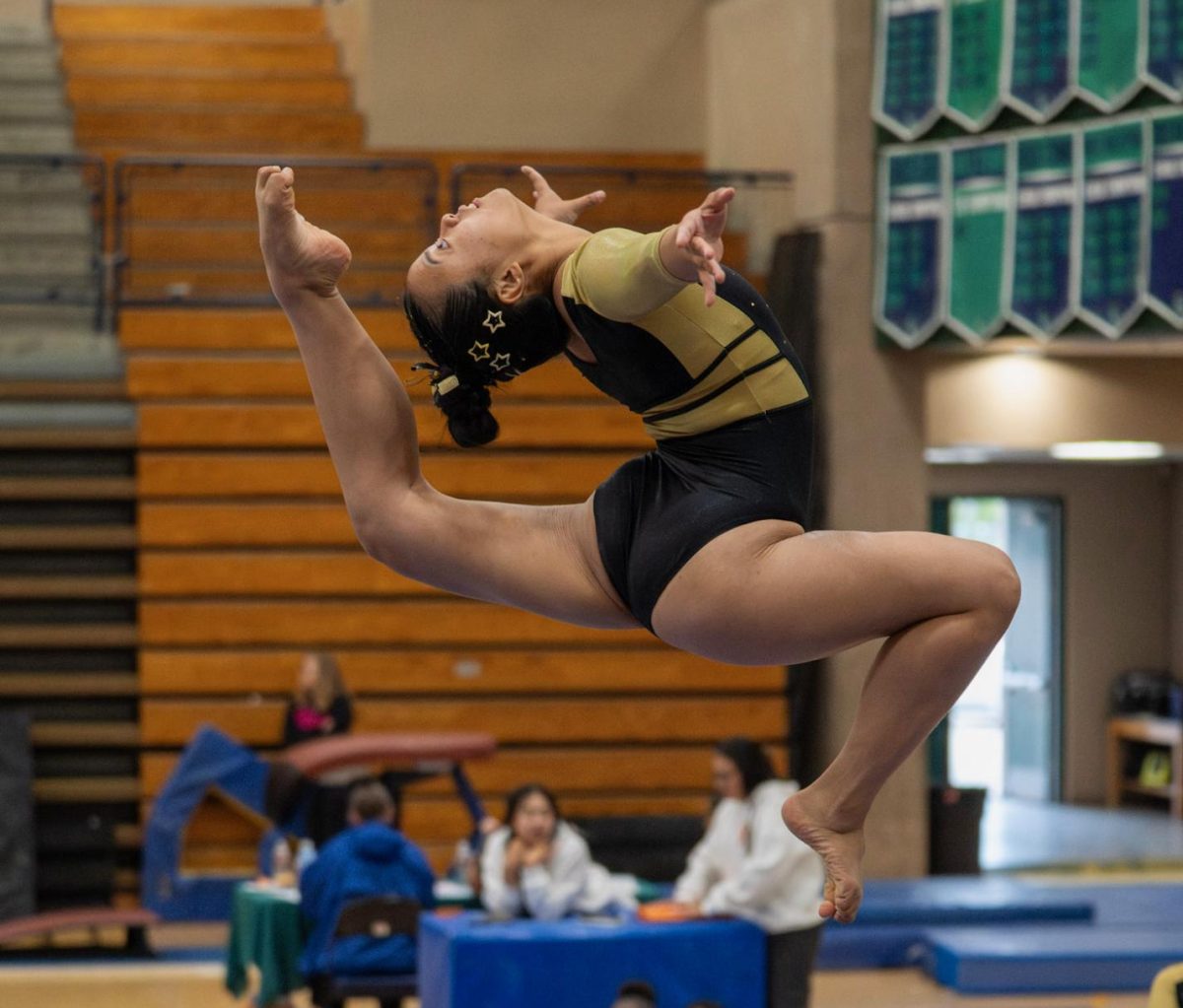 Joyce Chen (11) performs her signature move, a stag ring jump, during her beam routine at League Finals at La Costa Canyon, May 15, scoring her a 9.625. This routine later broke Westview’s previous school record, one held by Chen herself, with a 9.700 at CIF Finals, May 22.